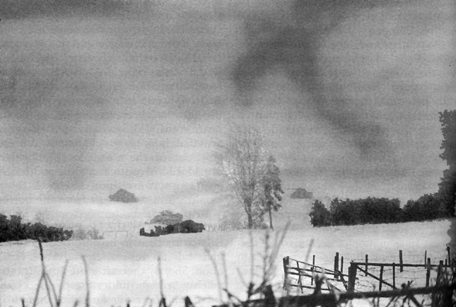 U.S. 6th Armored Division tanks in a snowstorm near Wardin during the winter campaign.
