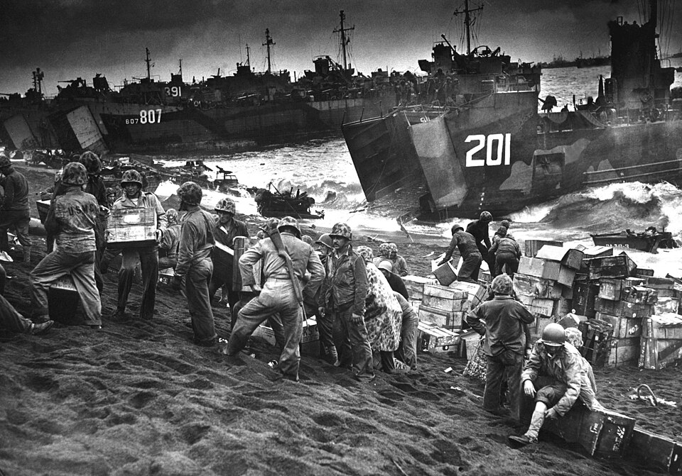 Landing craft deliver supplies to the Iwo Jima beachhead.