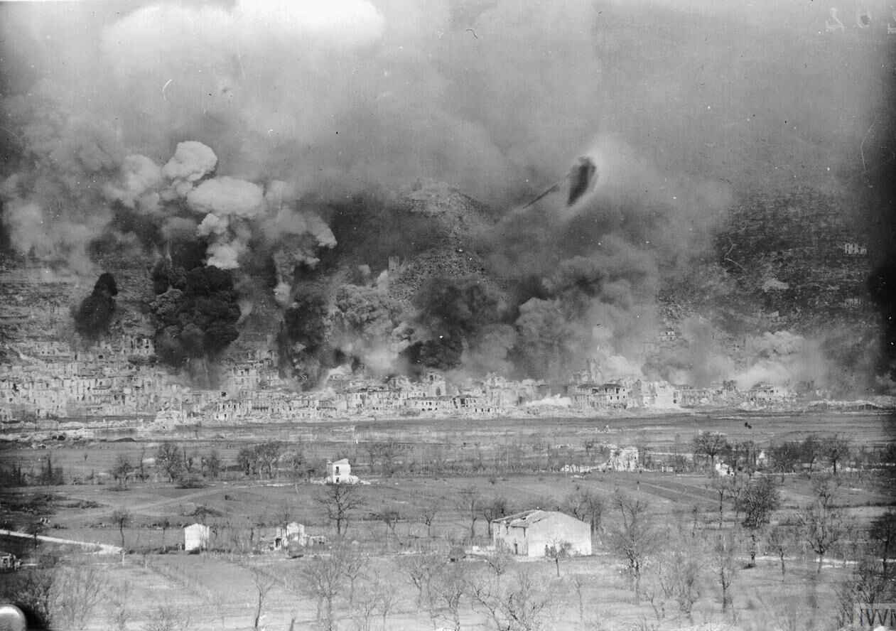 The bombardment of Cassino town on 15 March 1944, a month after the separate bombing of the abbey.
