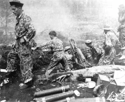 A Marine 75mm pack howitzer firing during the advance on the Cape Gloucester airfields