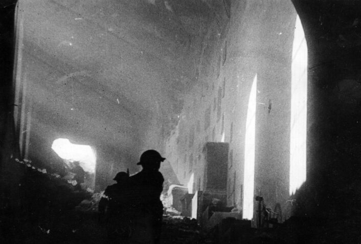 Polish soldiers among the ruins of the Monte Cassino monastery after its capture. Photographer unknown; public domain via Wikimedia Commons.